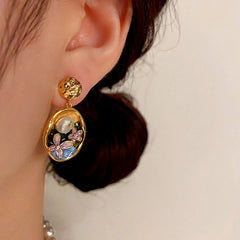 Close-up detail of the sparkling zircons and plating on the Pearl Flower Earrings