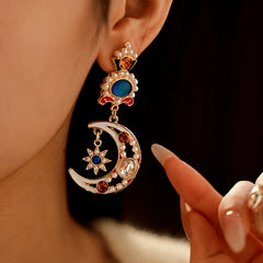 Close-up detail of the sparkling zircons and plating on the Moon Star Earrings