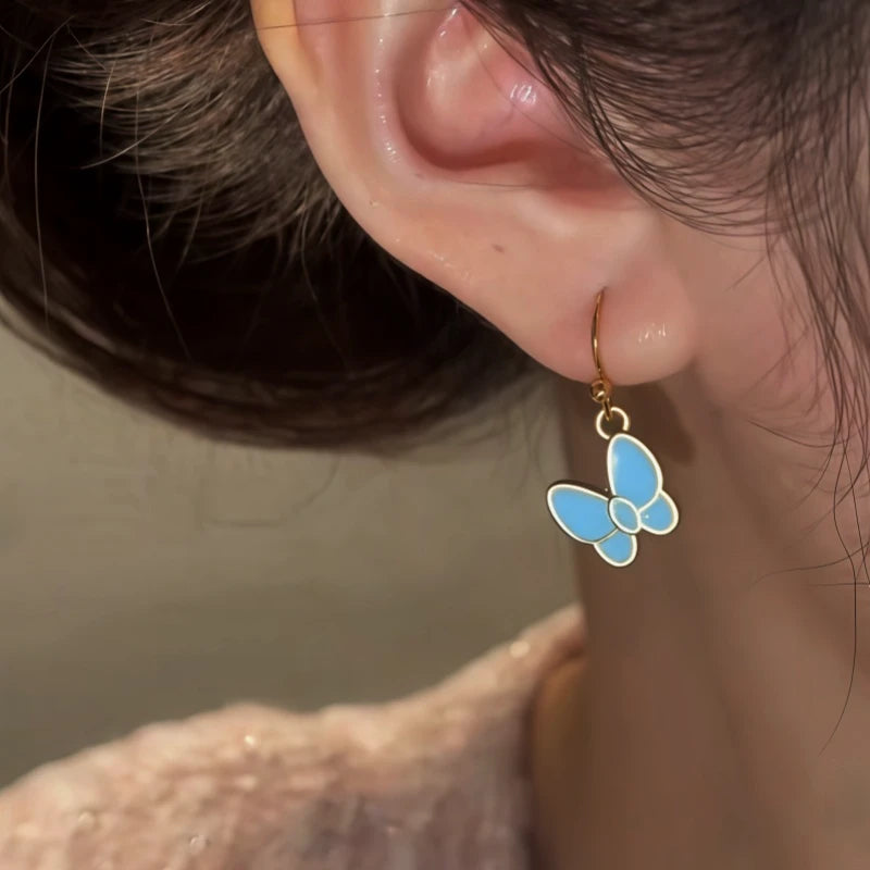 Close-up detail of the sparkling zircons and plating on the Butterfly Ear Hooks