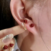 Dainty Red Rose & Red Bead Gold Dangle Stud Earrings on Ear