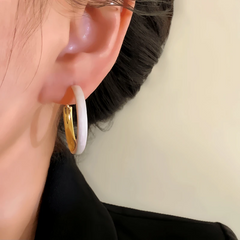 Close-up detail of the sparkling zircons and plating on the Oil Drop Hoops