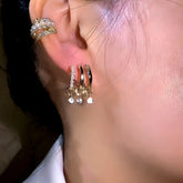 Gold pearl CZ drop huggie hoop earrings with matching ear cuff on ear