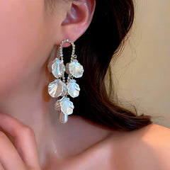 Close-up detail of the sparkling zircons and plating on the Petal Tassel Earrings