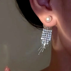 Close-up detail of the sparkling zircons and plating on the Zircon Tassel Earrings