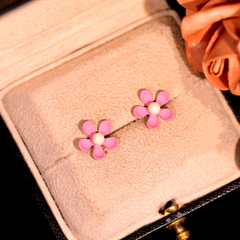 Angled view of the 14K Gold-Plated Pink Flower Stud Earrings