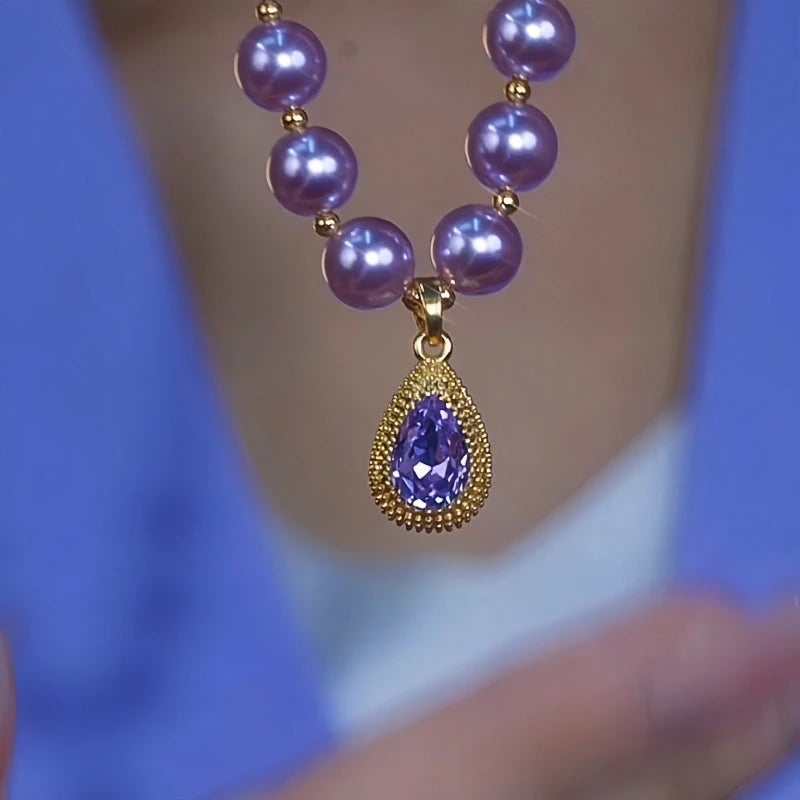 Detailed view of the 14K Gold-Plated Purple Diamond Pearl Water Drop Necklace chain and pendant