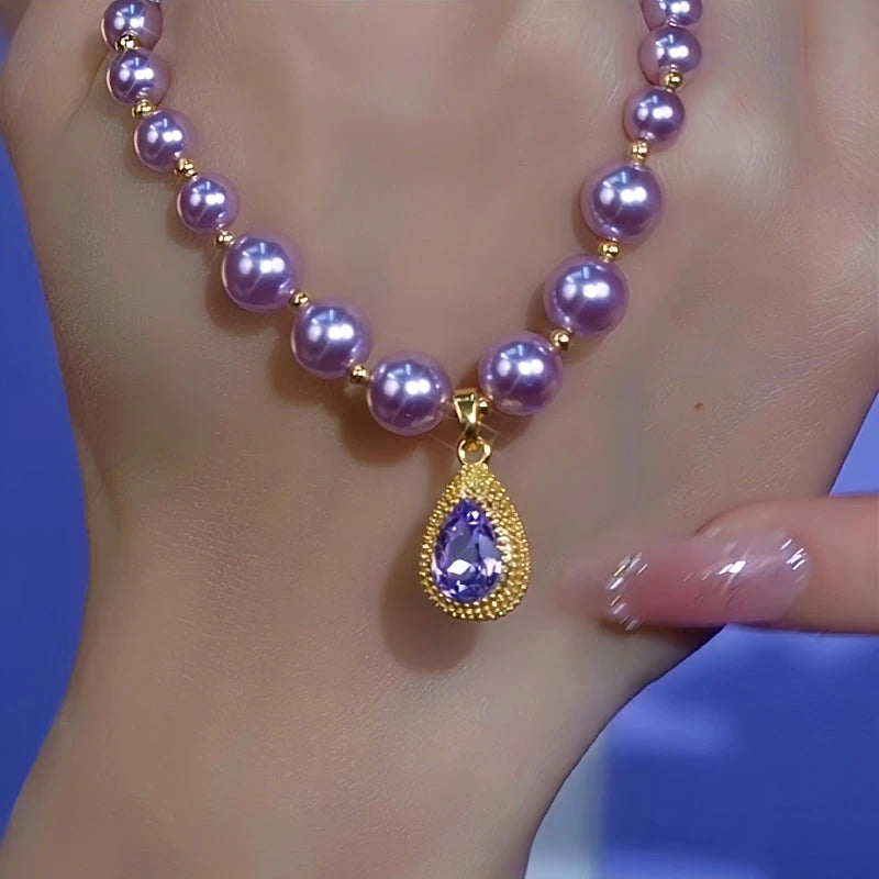 14K Gold-Plated Purple Diamond Pearl Water Drop Necklace worn to showcase its length and pendant detail