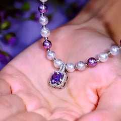 Detailed view of the 14K Gold-Plated Purple Full Diamond Sugar Cube Pearl Necklace chain and pendant