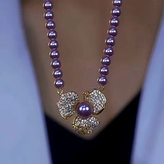 14K Gold-Plated Purple Pearl Flower Necklace worn to showcase its length and pendant detail