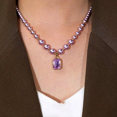 14K Gold-Plated Purple Zircon Diamond Pearl Necklace worn to showcase its length and pendant detail
