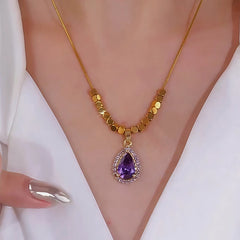 14K Gold-Plated Purple Zircon Diamond Water Drop Necklace worn to showcase its length and pendant detail