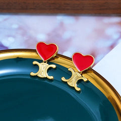 Close-up detail of the sparkling zircons and plating on the Red Heart Earrings