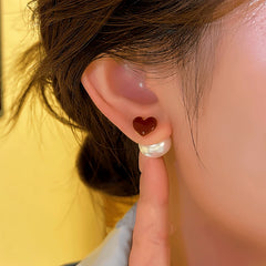 Close-up detail of the sparkling zircons and plating on the Heart Bead Earrings