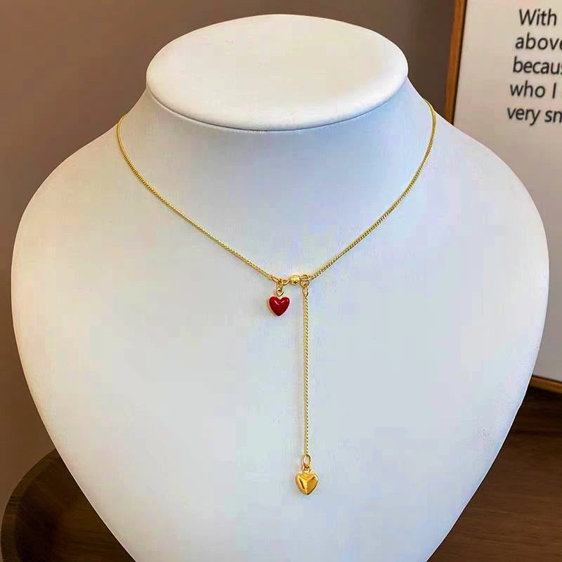 Close-up of the pendant and clasp on the Red Heart Necklace