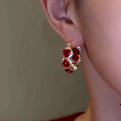 Close-up detail of the sparkling zircons and plating on the Rose Hoop Earrings
