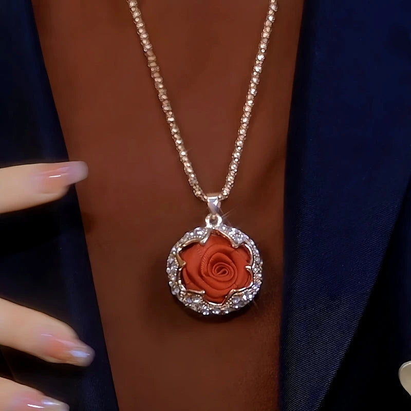Detailed view of the 14K Gold-Plated Red Rose Sweater Chain Necklace chain and pendant