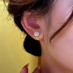 Close-up detail of the sparkling zircons and plating on the Bead Flower Earrings
