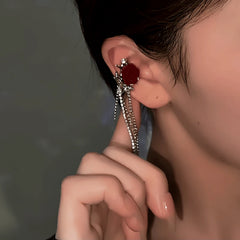 Model showcasing the dangle and style of the 14K Gold-Plated Rose Tassel Ear Cuffs ( 1 Pair )