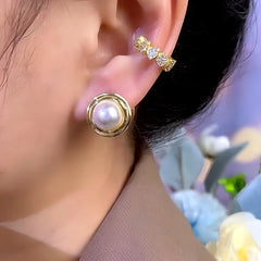 Close-up detail of the sparkling zircons and plating on the Round Pearl Earrings