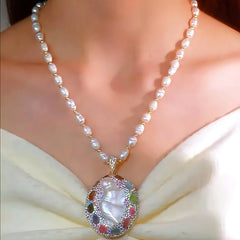 14K Gold-Plated Round Pearl Sweater Necklace worn to showcase its length and pendant detail