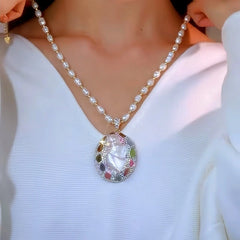 Close-up of the pendant and clasp on the Pearl Sweater Necklace
