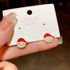 Angled view of the 14K Gold-Plated Santa Claus Stud Earrings