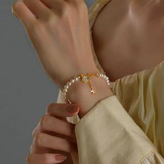Full view of the elegant 14K Gold-Plated Shell Starfish Pearl Bracelets