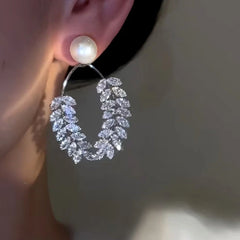Close-up detail of the sparkling zircons and plating on the Beaded Wheat Earrings