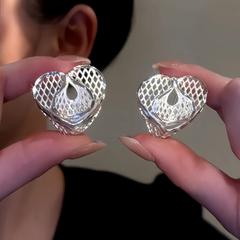 Close-up detail of the sparkling zircons and plating on the Simple Heart Studs