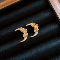Close-up detail of the sparkling zircons and plating on the Flower Moon Stud Earrings