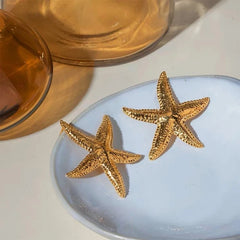 Angled view of the 14K Gold-Plated Starfish Earrings