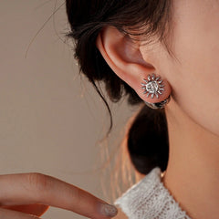 Angled view of the 14K Gold-Plated Sun Jacket Earrings