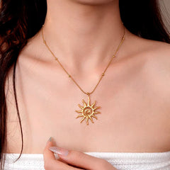 14K Gold-Plated Sun Pendant Necklace worn to showcase its length and pendant detail