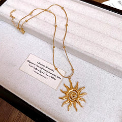 Close-up of the pendant and clasp on the Sun Pendant Necklace