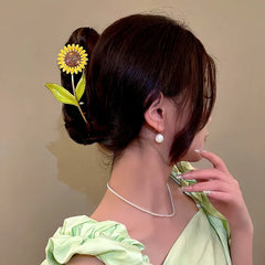 Close-up showing the material and craftsmanship of the Sunflower Hair Clip