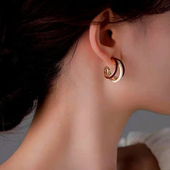 Close-up detail of the sparkling zircons and plating on the Three-Layer Hoops