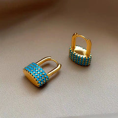 Angled view of the 14K Gold-Plated U-Shaped Ear Buckle Earrings