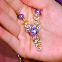 14K Gold-Plated Wheat Ear Purple Bead Necklace worn to showcase its length and pendant detail