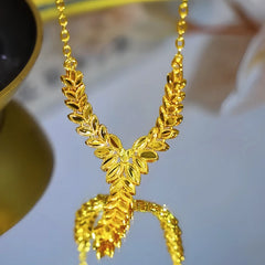 Close-up of the pendant and clasp on the Wheat Necklace