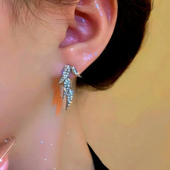 Close-up detail of the sparkling zircons and plating on the Bamboo Leaf Earrings