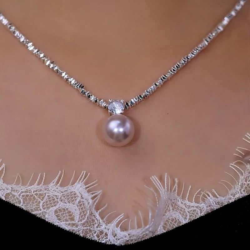 Close-up of the pendant and clasp on the Silver Pearl Necklace