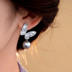 Close-up detail of the sparkling zircons and plating on the Gray Pearl Earrings