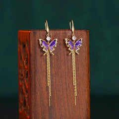Close-up detail of the sparkling zircons and plating on the Butterfly Threader Earrings