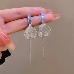 Angled view of the 14K Gold-Plated Zircon Butterfly Wing Tassel Earrings