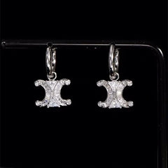 Angled view of the 14K Gold-Plated Zircon C-Shaped Earrings