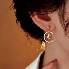 Close-up detail of the sparkling zircons and plating on the Star Hoop Earrings