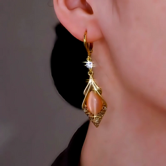 Close-up detail of the sparkling zircons and plating on the Brown Cat's Eye Earrings