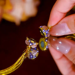 Close-up of the pendant and clasp on the Magnetic Clover Necklace