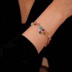 Close-up of the clasp and charm details on the Colorful Flower Bracelet