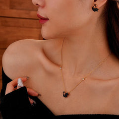 Close-up detail of the sparkling zircons and plating on the Black Swan Jewelry Set